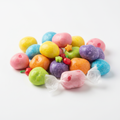 Colorful homemade bubble gum pieces on a white background